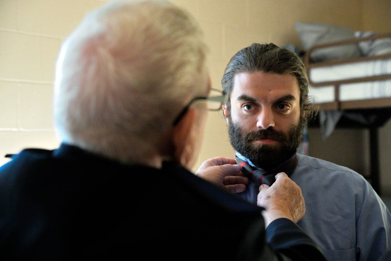 Salvation Army Officer talking and smiling with a community member.